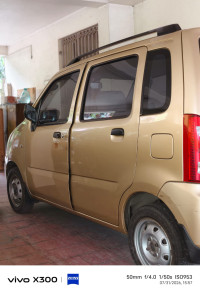 R Gold Maruti Suzuki Wagon R LXI Minor