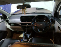 Polar White Hyundai i10 Sportz AMT