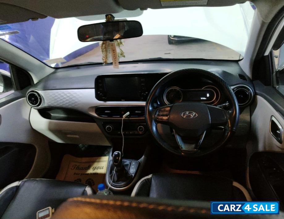 Polar White Hyundai i10 Sportz AMT