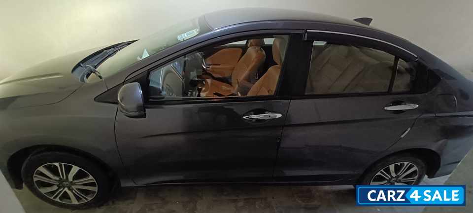 Modern Steel Metallic Honda City 1.5 V MT
