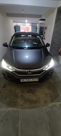 Modern Steel Metallic Honda City 1.5 V MT