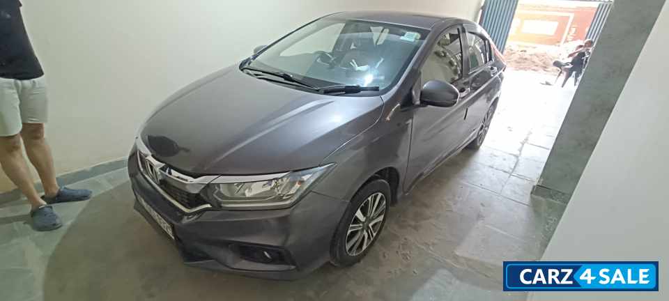 Modern Steel Metallic Honda City 1.5 V MT