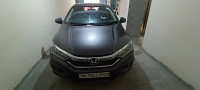 Modern Steel Metallic Honda City 1.5 V MT
