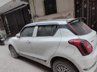 Artic White Maruti Suzuki Swift lxi