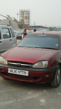 Maroon Ford Ikon