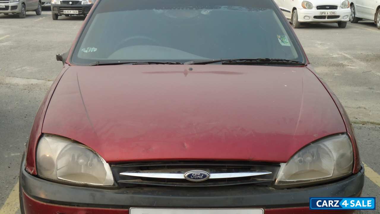 Maroon Ford Ikon