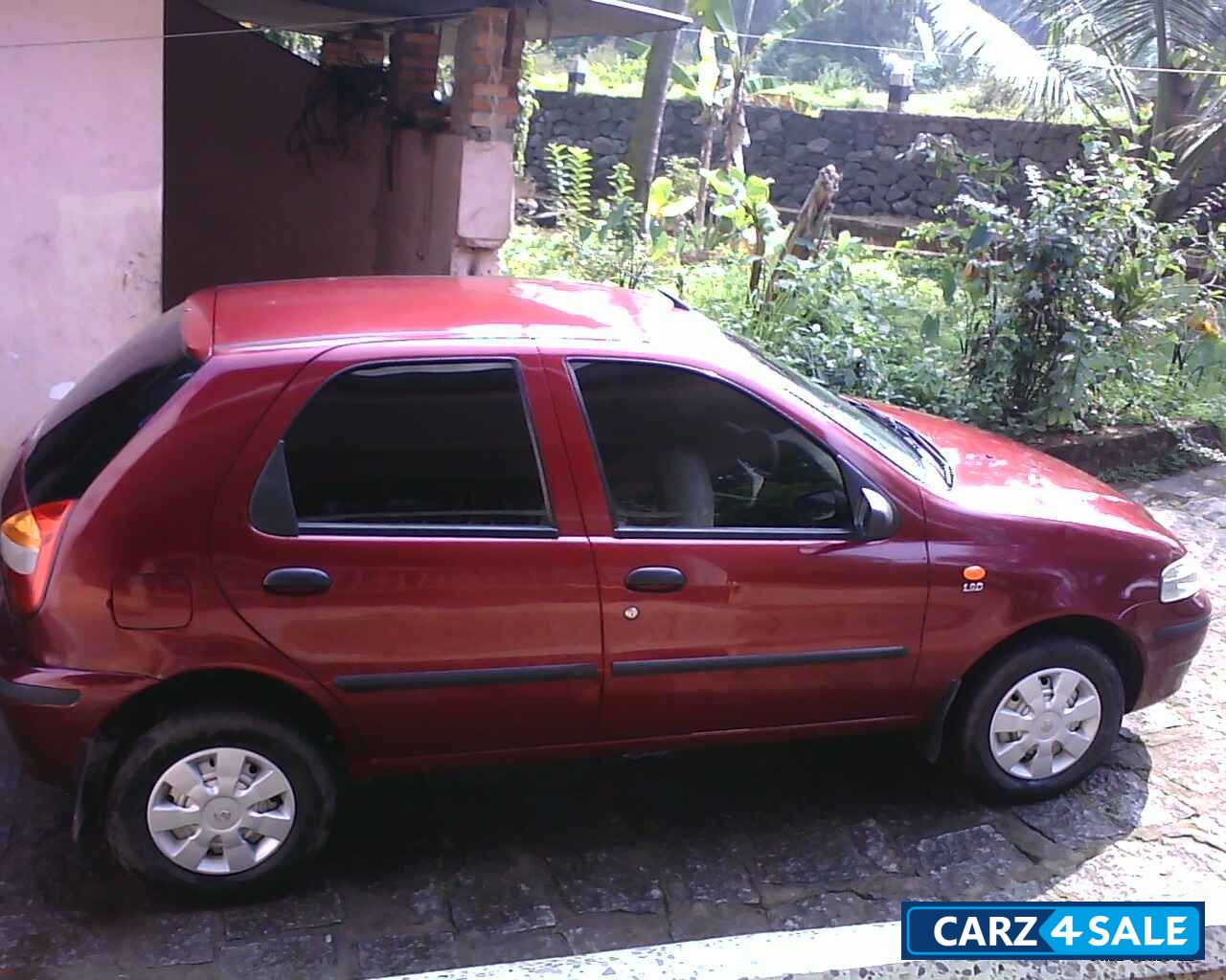 Burry Red Fiat Palio