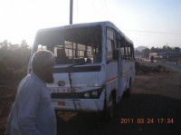 White eicher 10.75 bus 30 seater