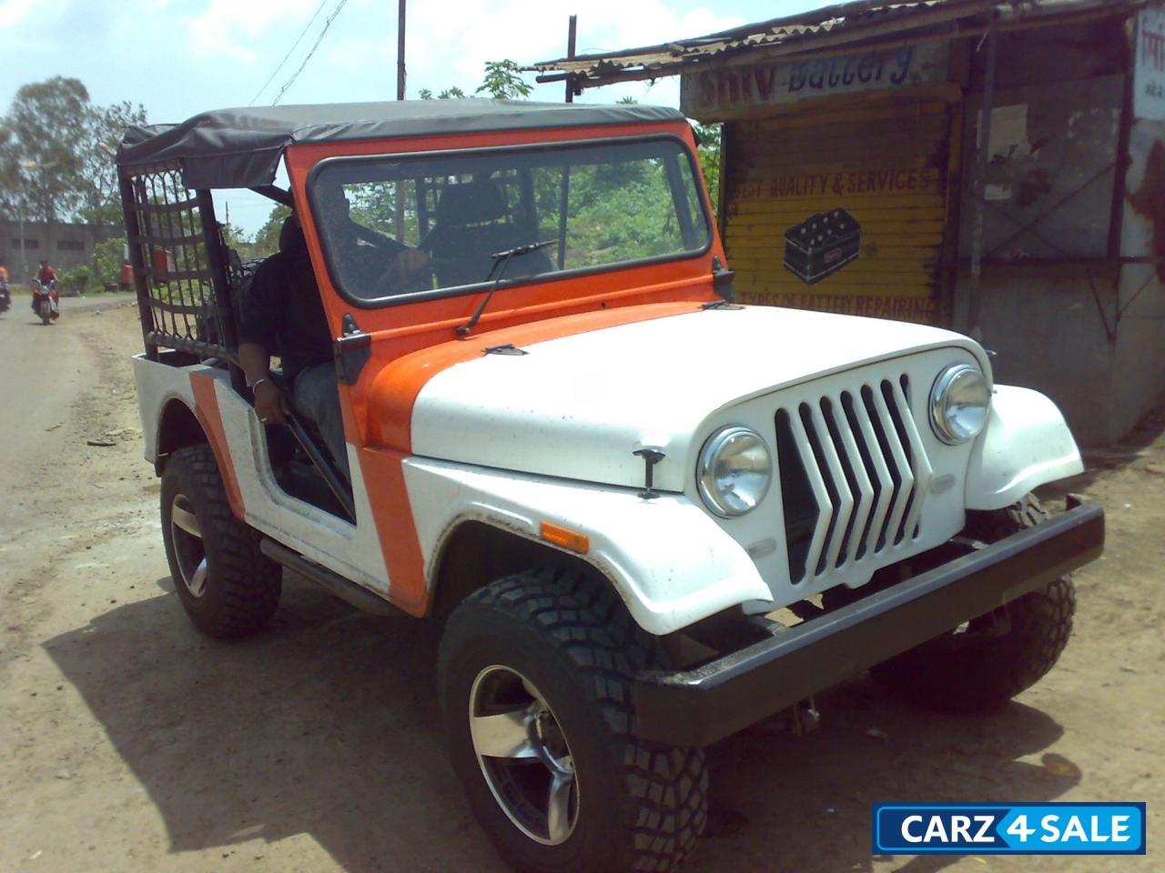 White Orange Mahindra Jeep