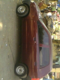 Maroon Maruti Suzuki Alto
