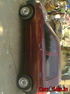 Maroon Maruti Suzuki Alto