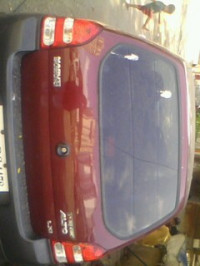 Maroon Maruti Suzuki Alto