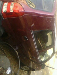 Maroon Maruti Suzuki Alto
