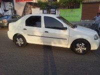 White Mahindra Renault Logan