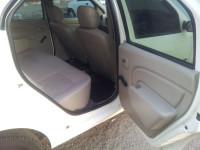 White Mahindra Renault Logan