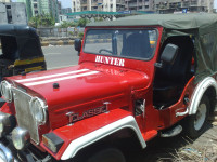 Red Mahindra Jeep