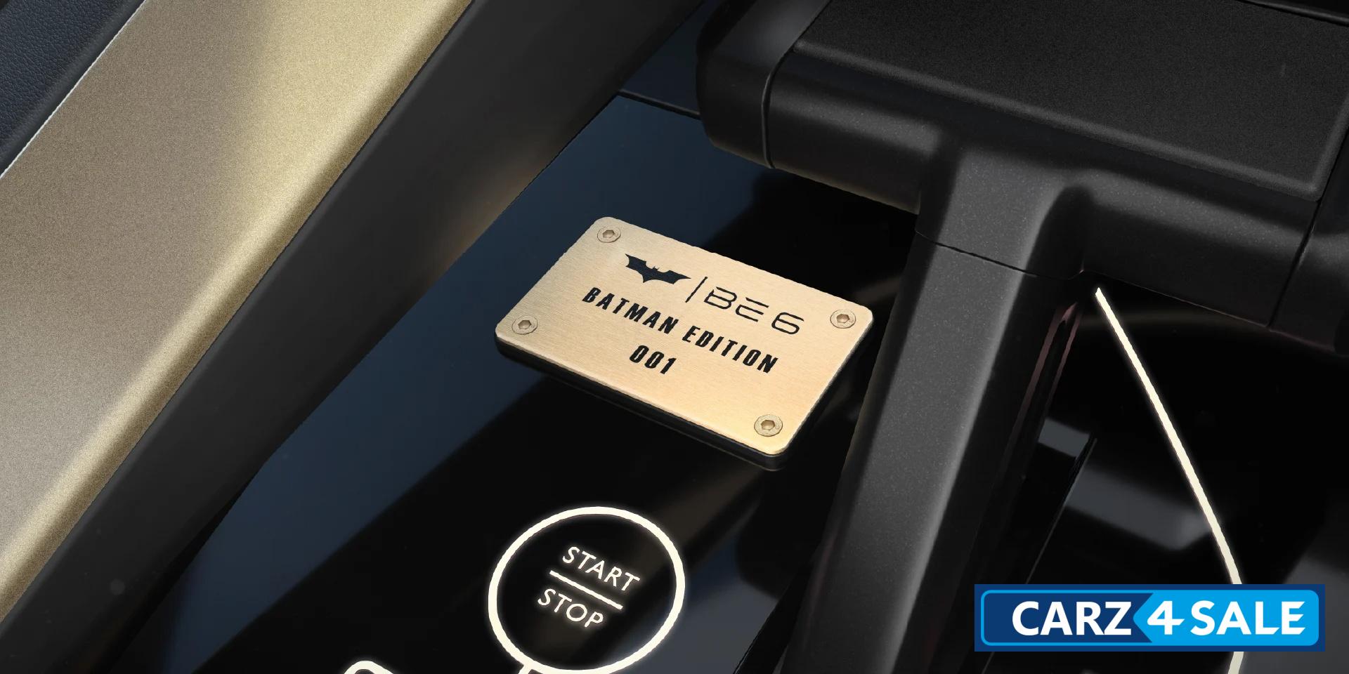 Mahindra BE 6 Batman Edition Brushed Alchemy Gold Batman Edition plaque on the dashboard with numbering
